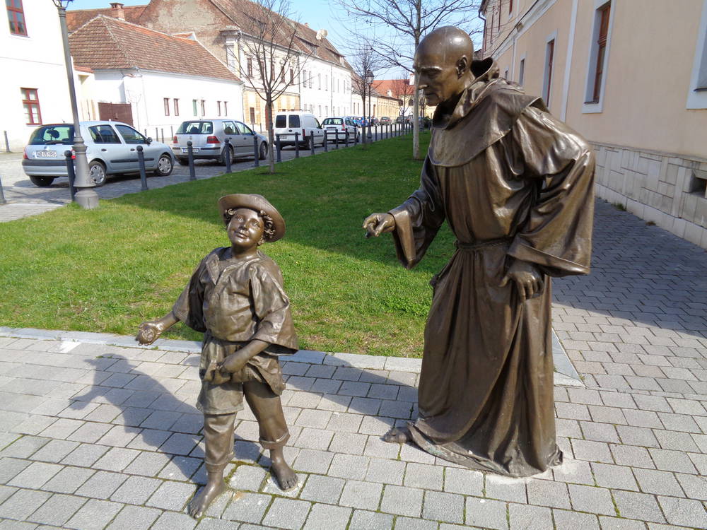 monk and child child in alba iulia romania